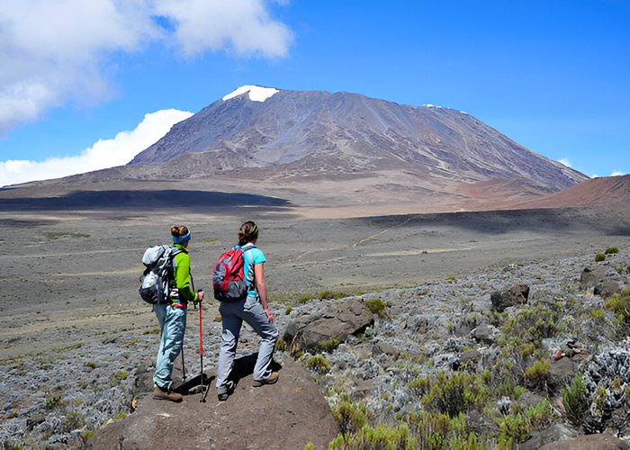Two ladies hiking Mt Kilimanjaro cover
